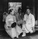 Korea: A Korean lady and her husband at their home, Seoul, early 20th century