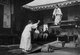 Korea: Two young Korean women playing on a see-saw, Seoul, early 20th century