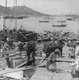 Korea: Junks loaded with bales of dried fish looking west across the harbour from the landing wharf, Chemulpo (Inchon, Incheon), early 20th century