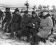 Korea: General Douglas MacArthur at the front line above Suwon, Korea, accompanied by Courtney Whitney, Matthew B. Ridgway, William B. Kean, and others, January 28, 1951